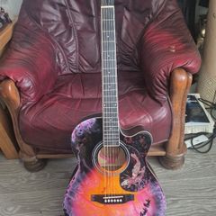 electroacoustic single cutaway decorated guitar