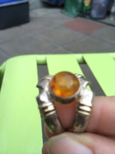 A lovely silver and gold ring with Amber stone