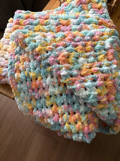 hand knitted baby blankets and cardigans