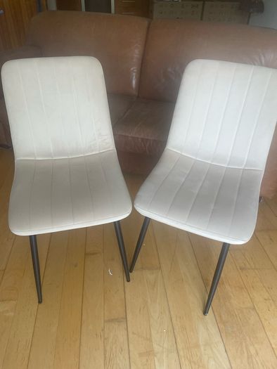 2 cream chairs