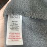 Dunnes grey skirt (as new) age 7-8 Image 3