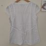 Kate Cooper white top Image 5