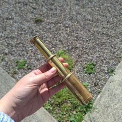 Brass pocket telescop possible to post