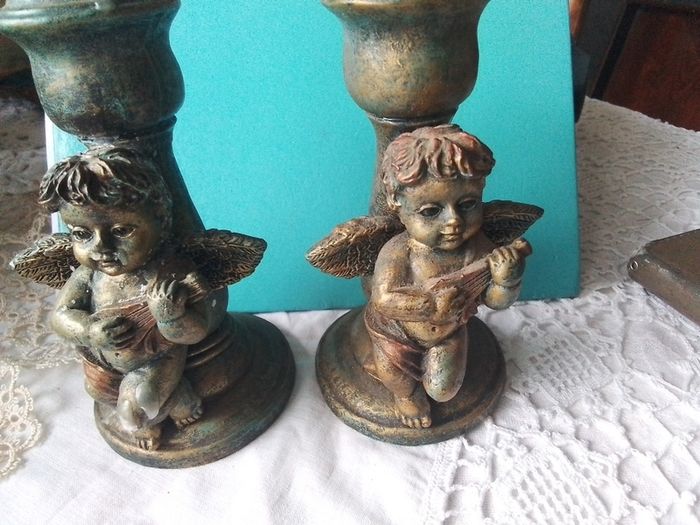 Two Churub Candlesticks