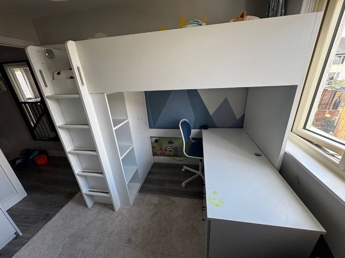 Bed with wardrobe and desk