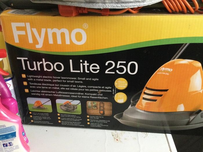 Turbo  lite 250 lawnmore for cutting grass at home  only one time use selling because moving home