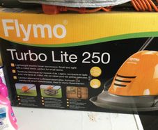 Turbo  lite 250 lawnmore for cutting grass at home  only one time use selling because moving home