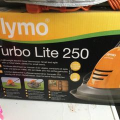 Turbo  lite 250 lawnmore for cutting grass at home  only one time use selling because moving home