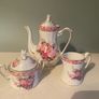 Vintage Porcelain small teapot sugar bowl and creamer set .       porcelain Image 3