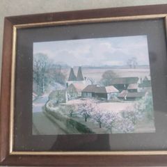 Small Framed Print Of Village Scene .