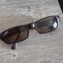 Vintage Ray-Ban sunglasses, Made in USA, with B&L engraved lenses and brown tortoiseshell frame. Lenses are in good condition, frame shows signs of wear. Please see all photos for details. Image 2