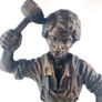 Vintage metal figurine of a blacksmith Image 4