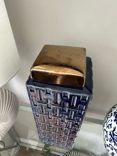 Blue and gold square lidded jar.