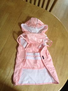 Worn once cute dog/cat raincoat