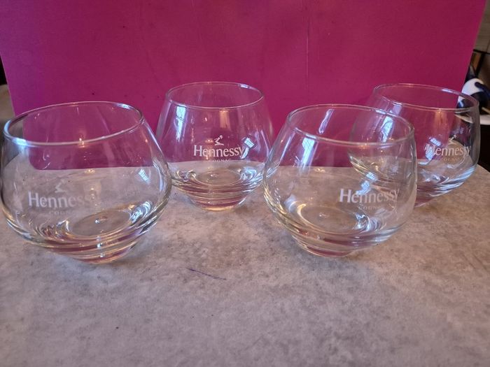 A Set of 4 Hennessy Cognac Glasses Branded with the Hennessy Cognac Logo