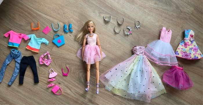 barbie with clothes and accessories