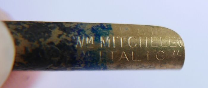 Vintage dip pen with collection of assorted nibs