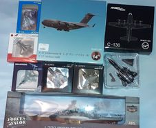 1:200 diecast jet collection and a 1:700 battleship lot - offer 1 euro for pm purposes to buy individually