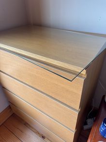 Malm four drawer dresser with glass top