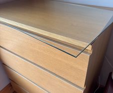 Malm four drawer dresser with glass top