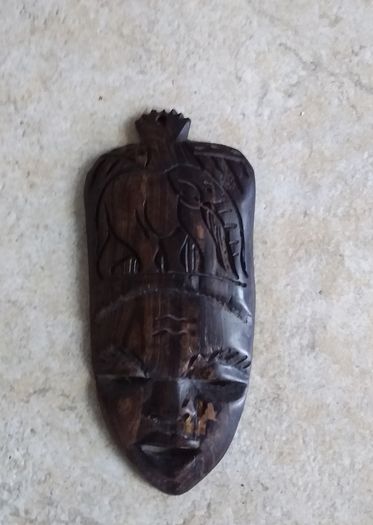 Handcarved Wooden Tribal Mask with Elephant Carving