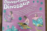Brand new convertible dinosaur "playmat" book.