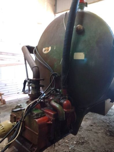 Slurry spreader with raingun