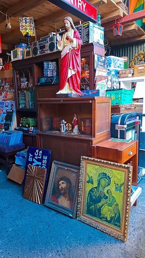 Antique holy statue and pictures