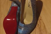 Blue heels with red sole UK6
