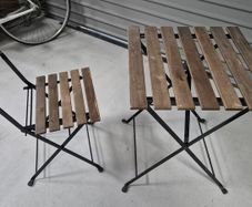 2 IKEA folding tables and 4 matching folding chairs.