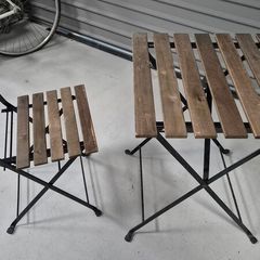 2 IKEA folding tables and 4 matching folding chairs.