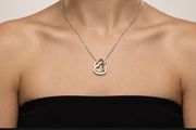 Sterling silver double heart necklace with real diamond accent
