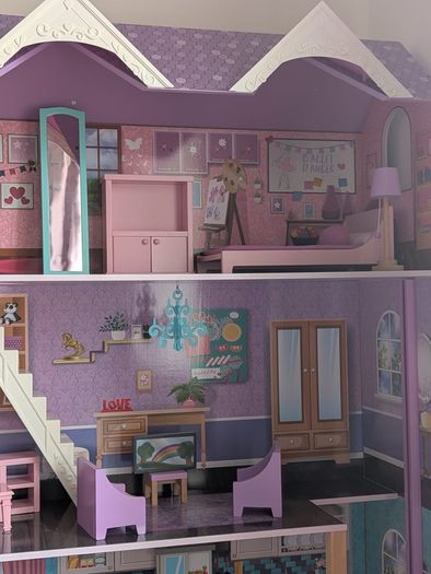 Large wooden dolls house with furniture