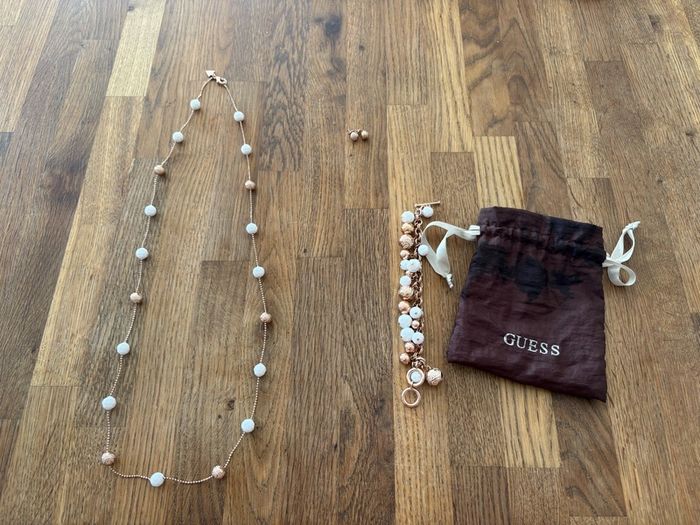 Guess 3 piece rose gold and white jewellery set.l