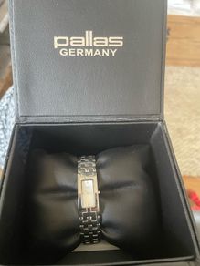 As New ladies silver watch.
