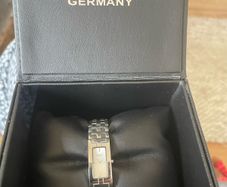 As New ladies silver watch.