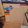 Easel And Selection Of Paints And Book Image 2