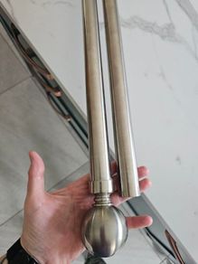 Chrome silver curtain rail with rings