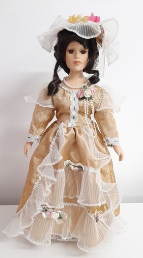 9 x  Porcelain dolls