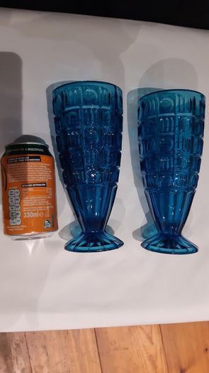 A pair of blue/deep turquoise glass vases