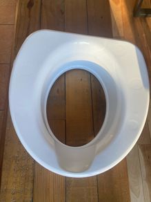 Raised toilet seat