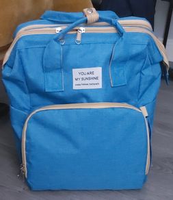 Brand New Nappy bag that converts to mini crib also