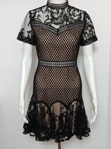 TD True Decadence black mini dress