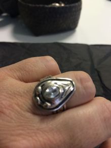 Silver ring with white  stone