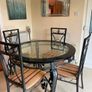 Wrough iron table and 4 chairs Image 7