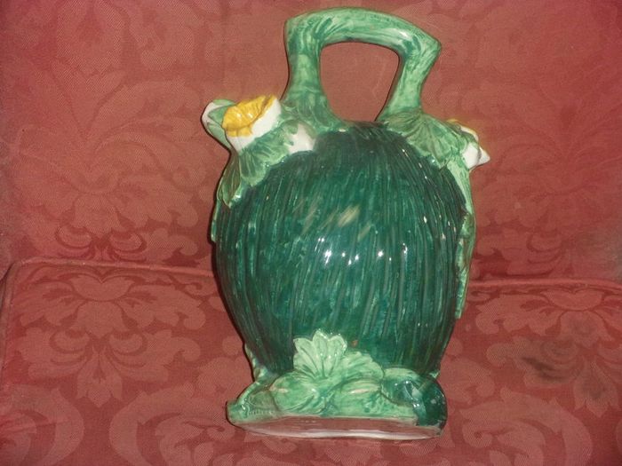 antiques majolia water jug in the shape of a mellan