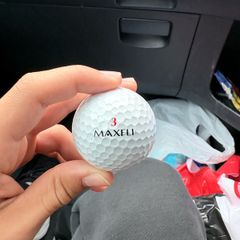 Maxfli number 3 golf ball.