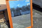 Large wooden bevelled mirror