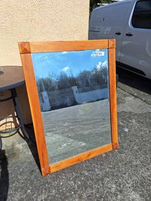 Large wooden bevelled mirror