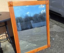 Large wooden bevelled mirror